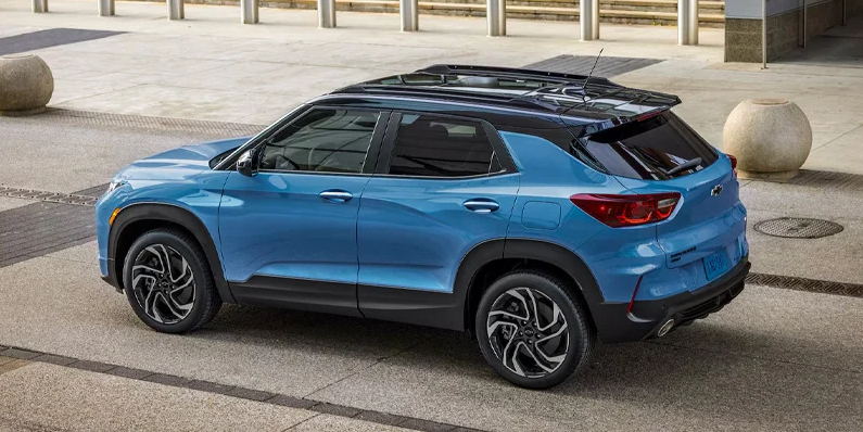 A blue 2026 Chevrolet Trailblazer parked on the side of the road.